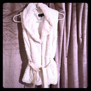 White fur vest